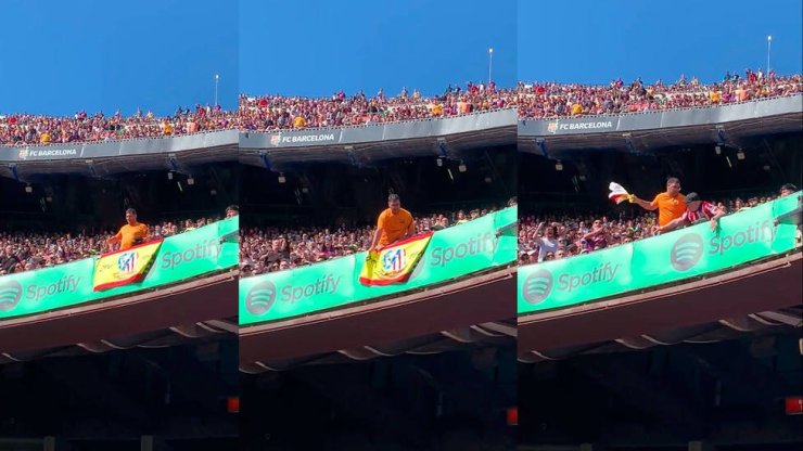 Болельщик «Барселоны» сорвал флаг Испании с эмблемой «Атлетико»